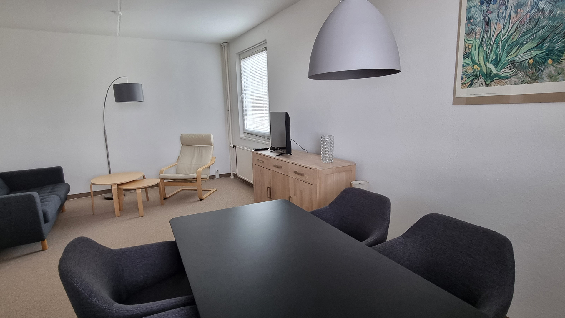 WohnBau_Mieten-Gaestewohnung_Wohnzimmer-1